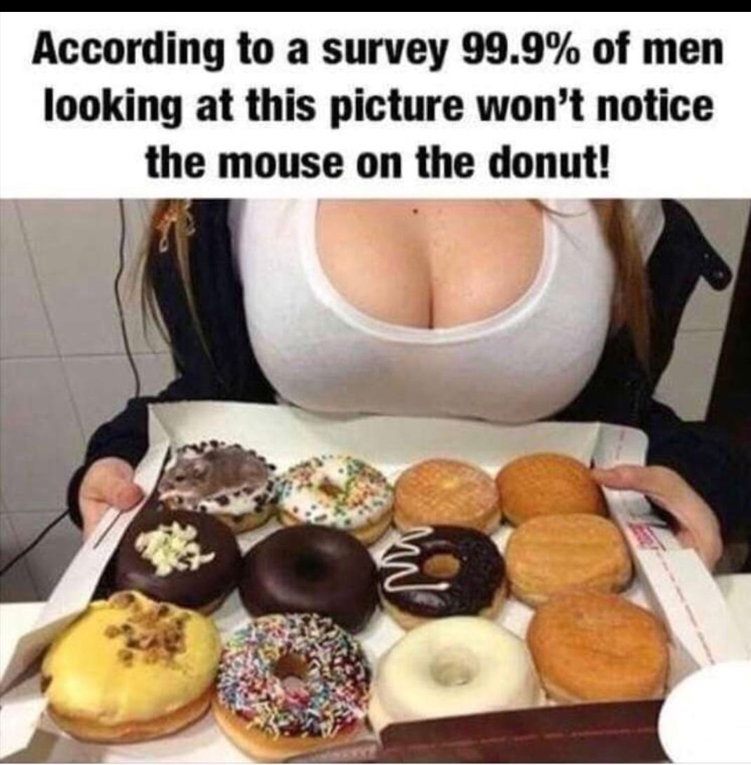 According to a survey 999 of men looking at this picture wont notice the mouse on the donut 3