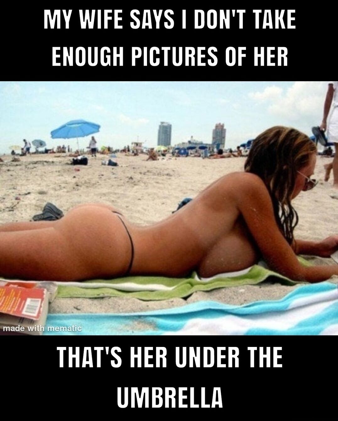 MY WIFE SAYS DONT TRKE ENOUGH PICTURES OF HER THATS HER UNDER THE UMBRELLA