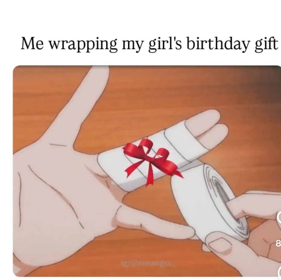 Me wrapping my girl's birthday gift