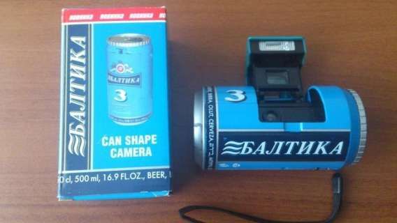 Балтика на упаковке и устройстве; текст на коробке: «Балтика» слева вертикально; «CAN SHAPE CAMERA»; «3»; «Beer»; на устройстве: «3» и «Балтика»; мелкий текст у основания может быть «Beer».
Session ID: 1107884.