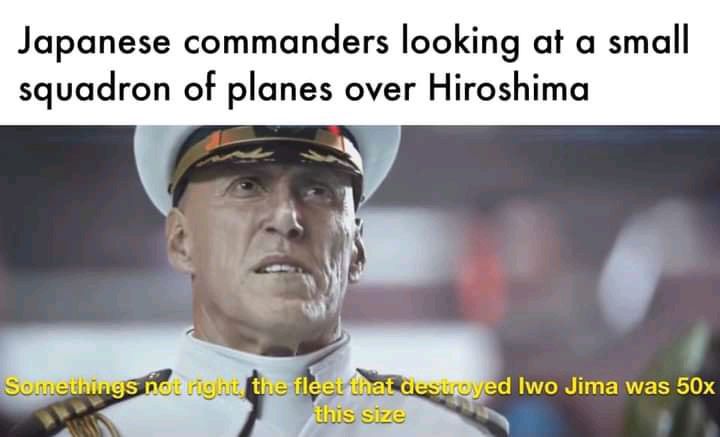 Japanese commanders looking at a small squadron of planes over Hiroshima