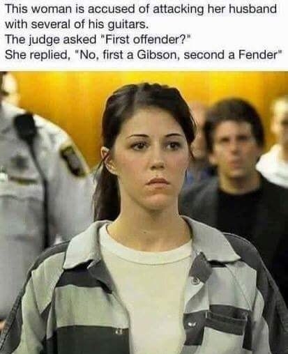 This woman is accused of attacking her husband with several of his guitars The judge asked First offender She replied No first a Gibson second a Fender