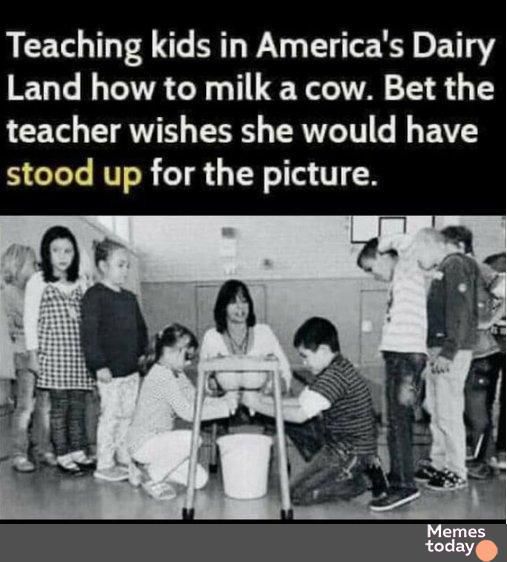 Teaching kids in Americas Dairy Land how to milk a cow Bet the teacher wishes she would have stood up for the picture