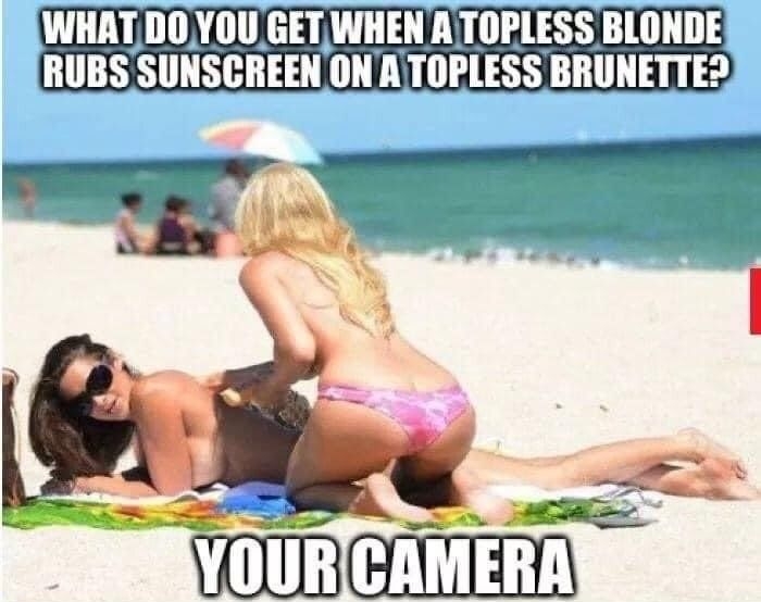 WHATD0YOU GETWHEN ATOPLESS BLONDE RUBS SUNSCREEN ONTOPLESS BRUNETTER