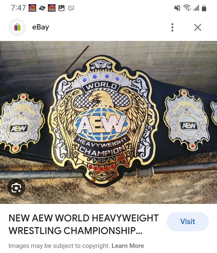 74 EeED S N ale eBay H X NEW AEW WORLD HEAVYWEIGHT g WRESTLING CHAMPIONSHIP pyright Lear More
