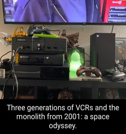 Three generations of VCRs and the monolith from 2001 a space odyssey