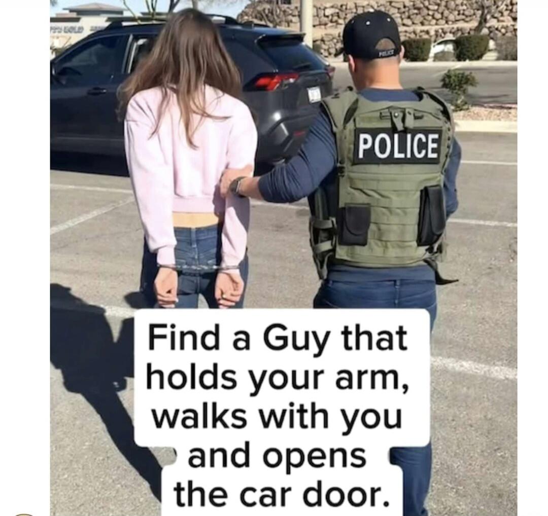Find a Guy that holds your arm, walks with you and opens the car door. A woman is being handcuffed by a police officer who is leading her towards a car.