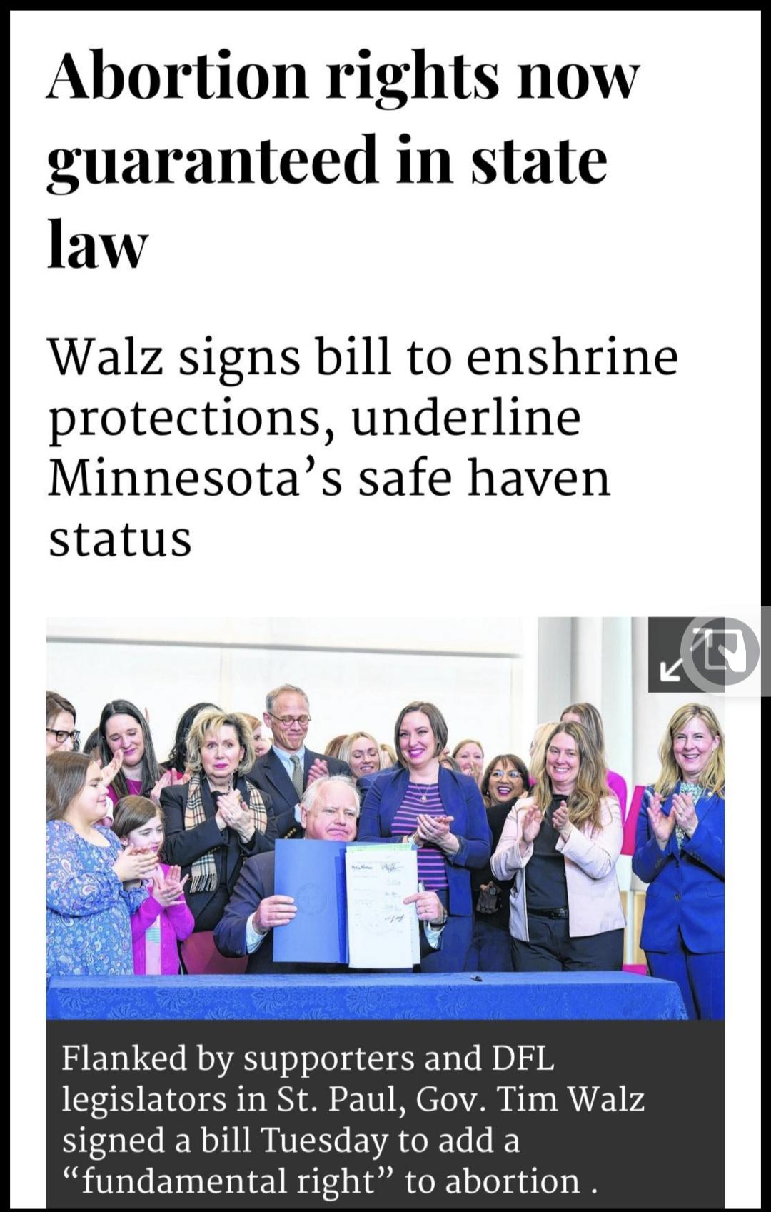 Abortion rights now guaranteed in state law Walz signs bill to enshrine protections underline Minnesotas safe haven Flanked by supporters and DFL legislators in St Paul Gov Tim Walz BEGEER NI NI VAL fundamental right to abortion