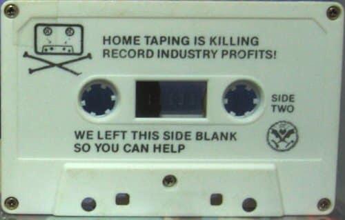 Q HOME TAPING IS KILLING RECORD INDUSTRY PROFITS Q Om WE LEFT THIS SIDE BLANK SO YOU CAN HELP