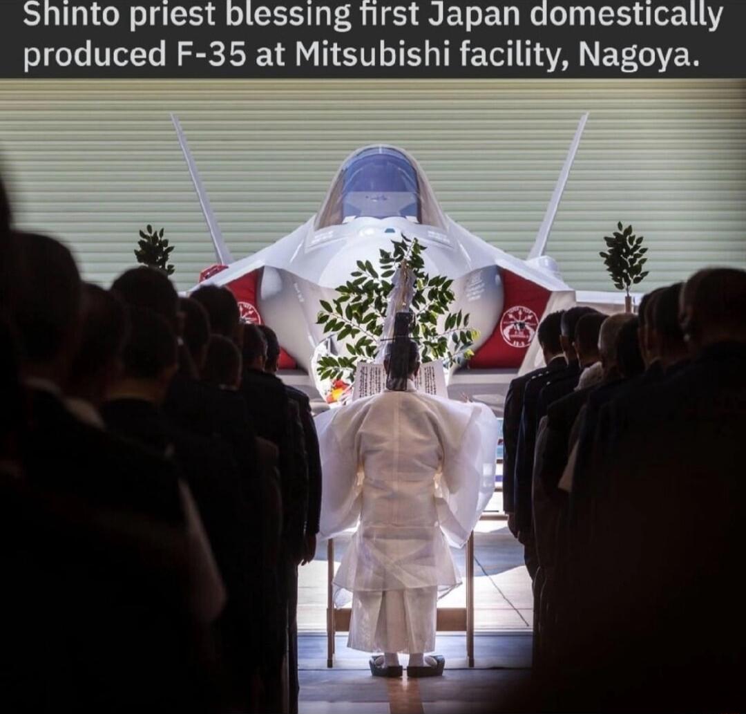 Shinto priest blessing first Japan domestically produced F 35 at Mitsubishi facility Nagoya