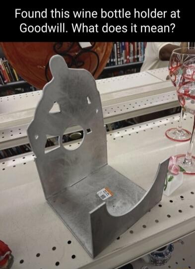 Found this wine bottle holder at Goodwill. What does it mean?
