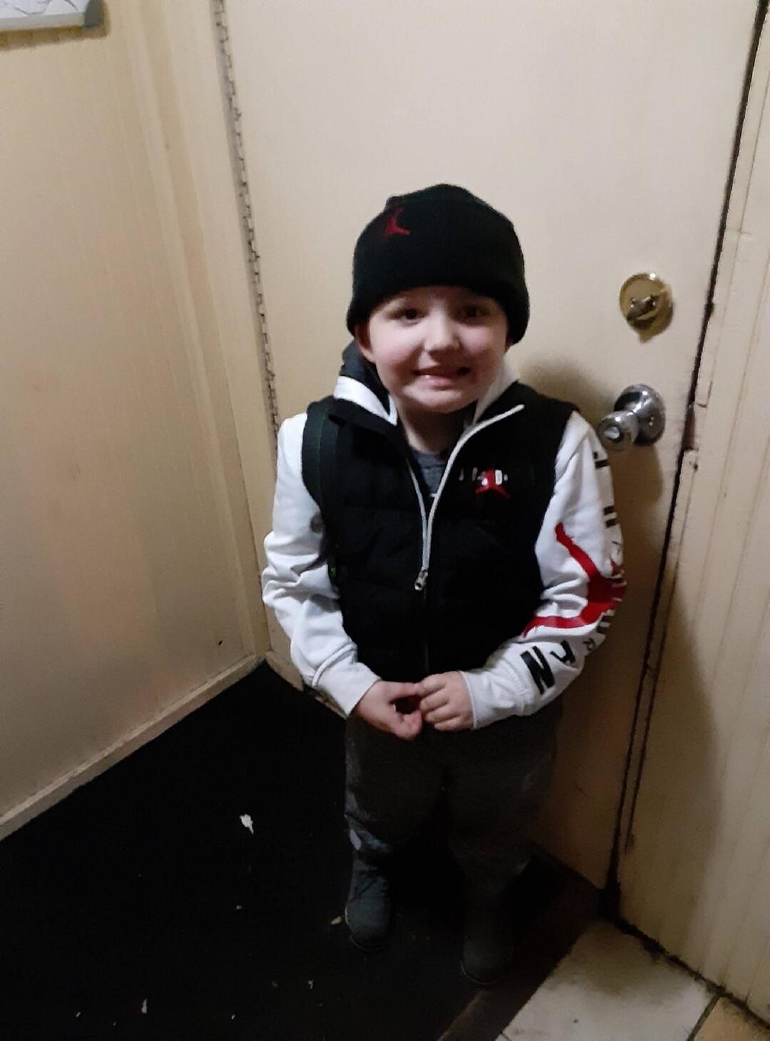 Jordan logo on beanie and shirt.