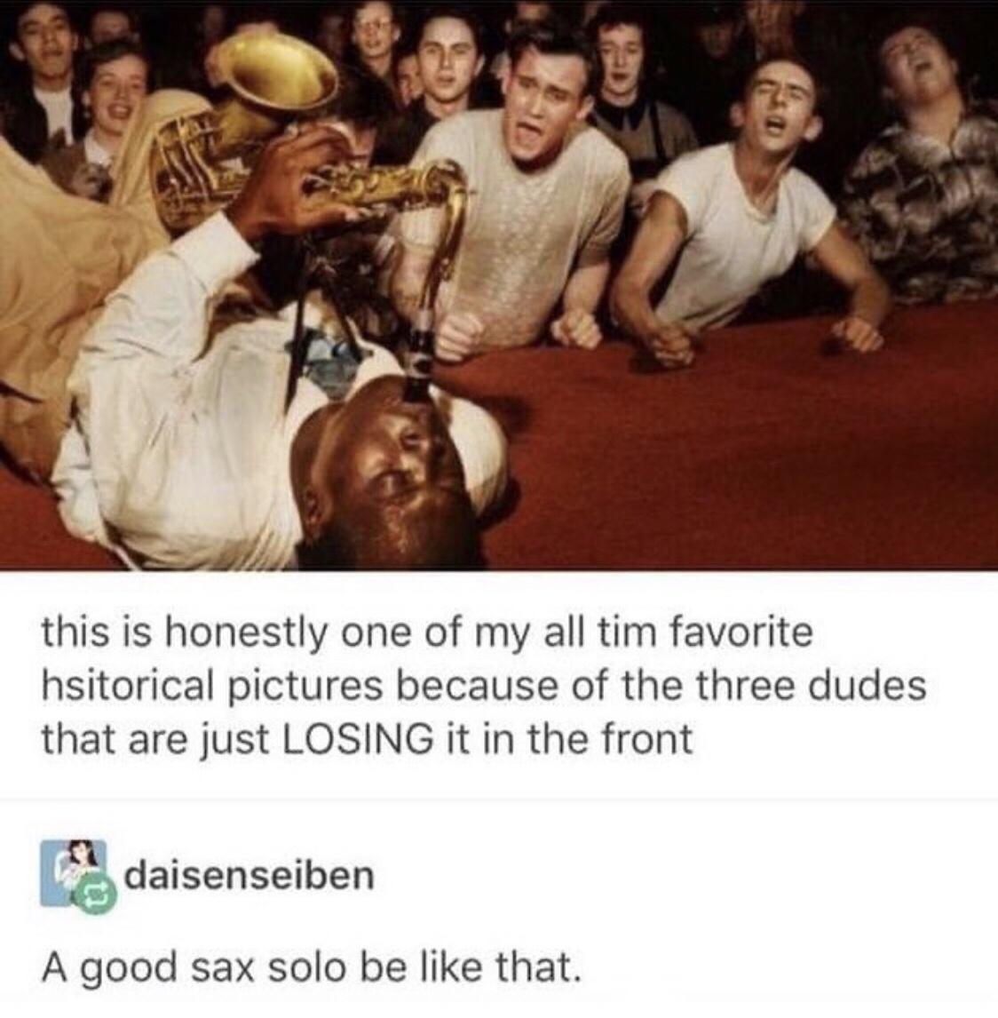 this is honestly one of my all tim favorite hsitorical pictures because of the three dudes that are just LOSING it in the front daisenseiben A good sax solo be like that