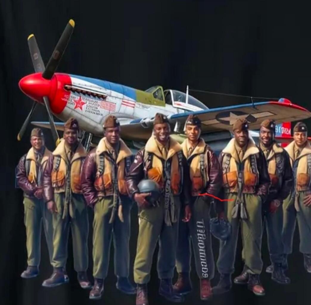 Group of pilots in vintage flight suits standing in front of a propeller airplane.
