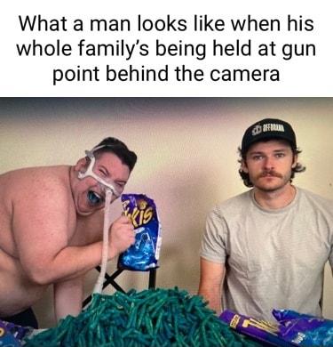 What a man looks like when his whole familys being held at gun point behind the camera
