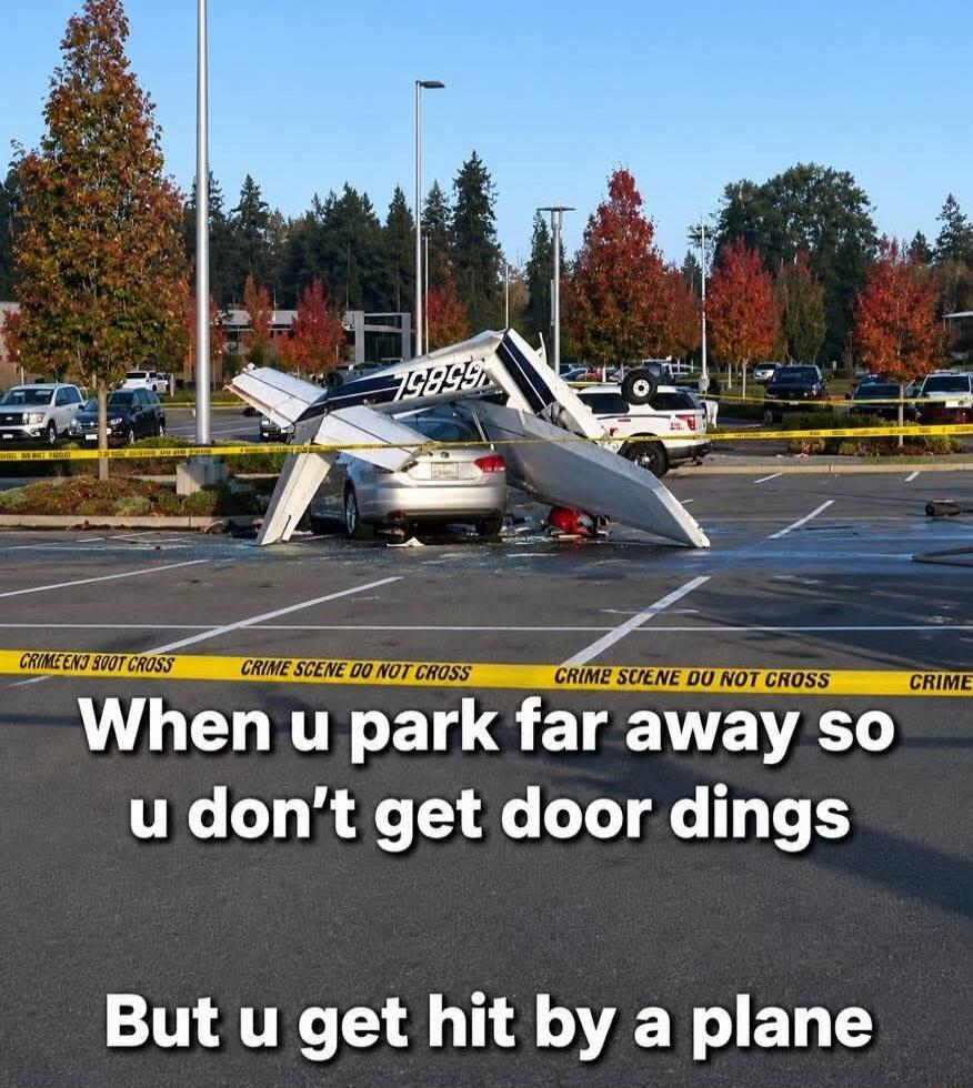 When u park far away so u don't get door dings But u get hit by a plane. A small plane has crashed into a silver car in a parking lot, surrounded by yellow 'CRIME SCENE DO NOT CROSS' tape.