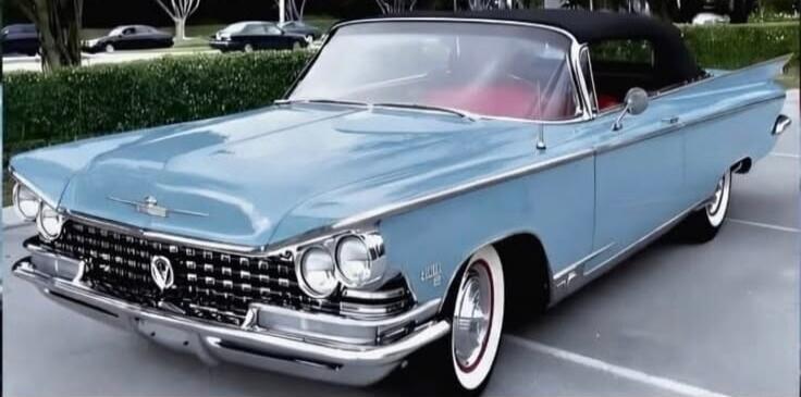 Blue vintage convertible car (classic car)