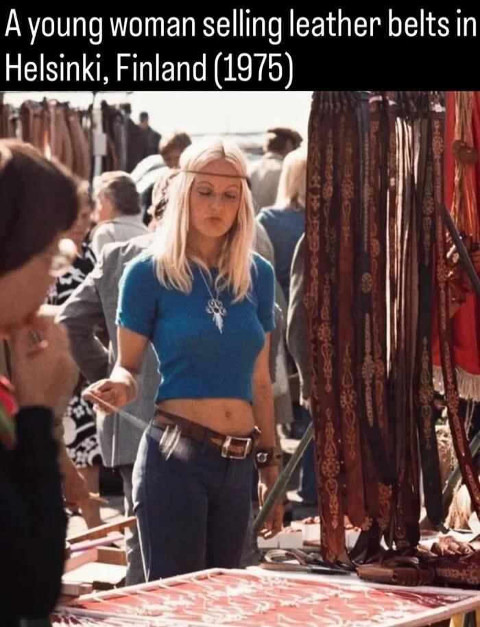A young woman selling leather belts in Helsinki, Finland (1975)