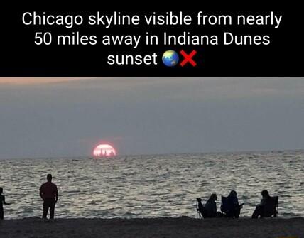 Chicago skyline visible from nearly 50 miles away in Indiana Dunes sunset 0