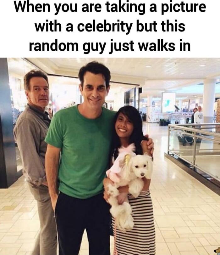 When you are taking a picture with a celebrity but this random guy just walks in
