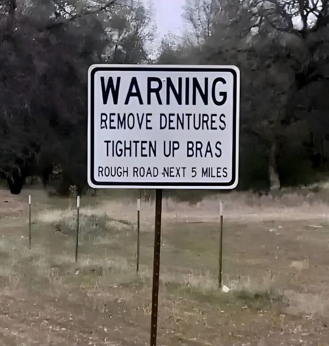 WARNING REMOVE DENTURES TIGHTEN UP BRAS ROUGH ROAD NEXT 5 MILES