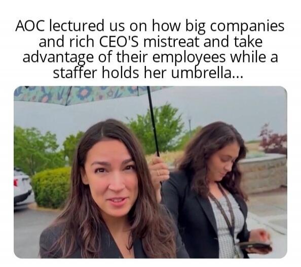 AOC lectured us on how big companies and rich CEO'S mistreat and take advantage of their employees while a staffer holds her umbrella...