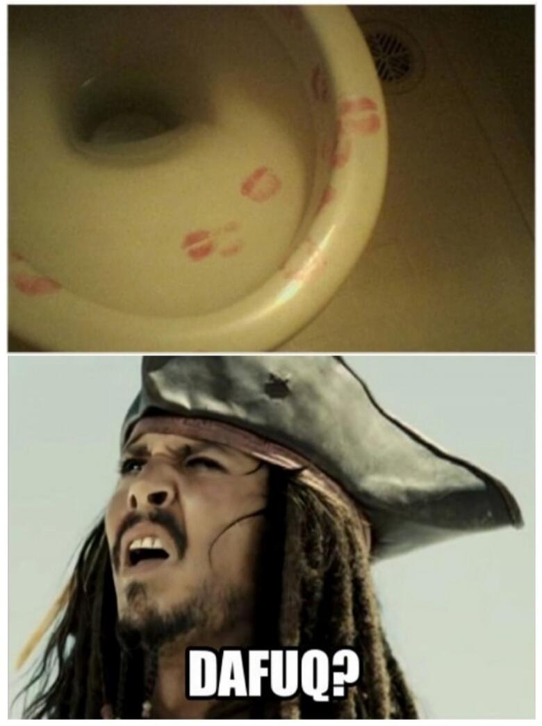 DAFUQ? A toilet bowl is covered in red lipstick kiss marks. Captain Jack Sparrow looks confused and disgusted.