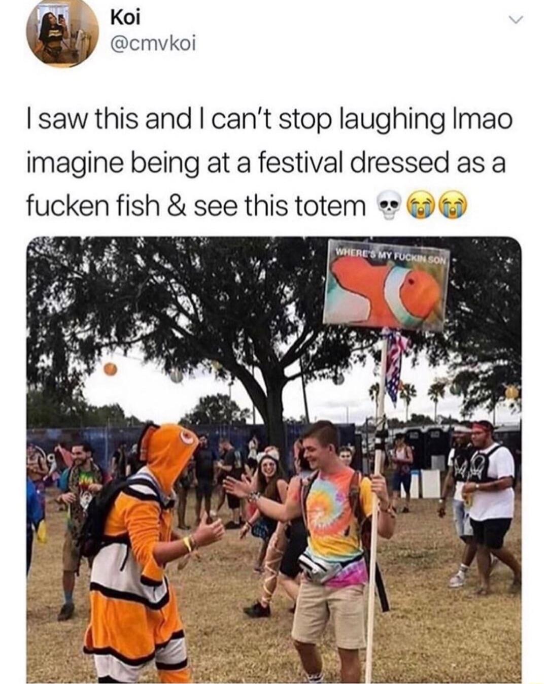 Koi w cmvkoi saw this and cant stop laughing Imao imagine being at a festival dressed as a fucken fish see this totem e