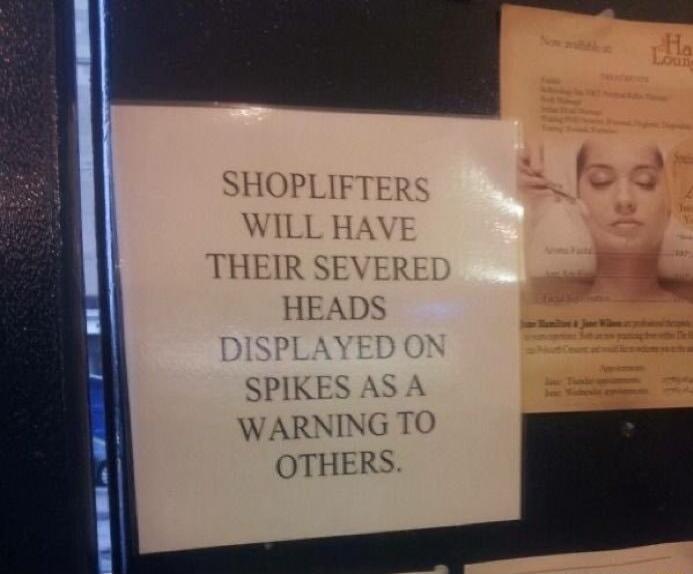 HEADS SPIKES AS A WARNING T OTHERS