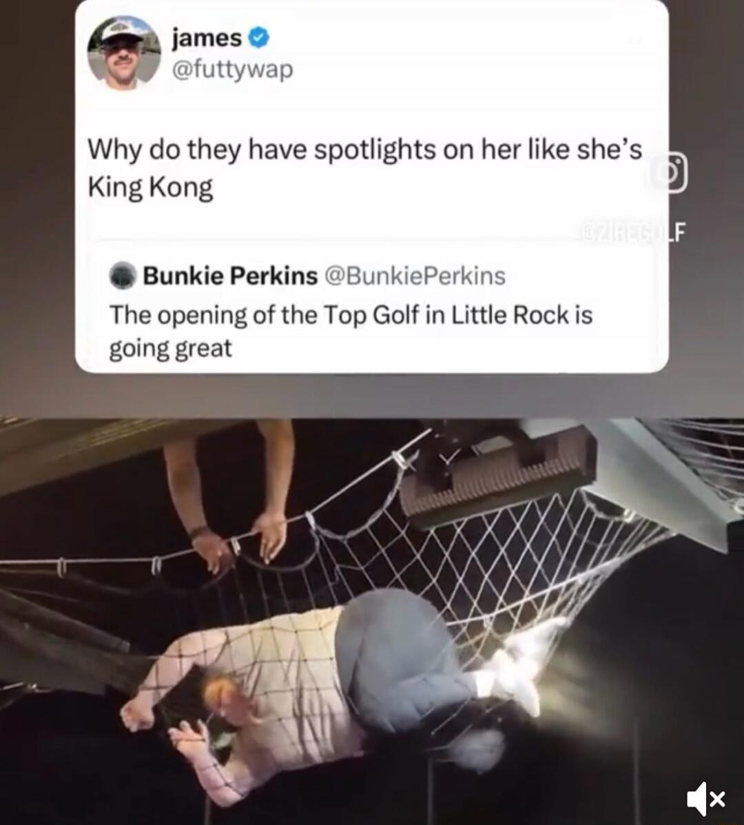 Why do they have spotlights on her like she's King Kong. The opening of the Top Golf in Little Rock is going great