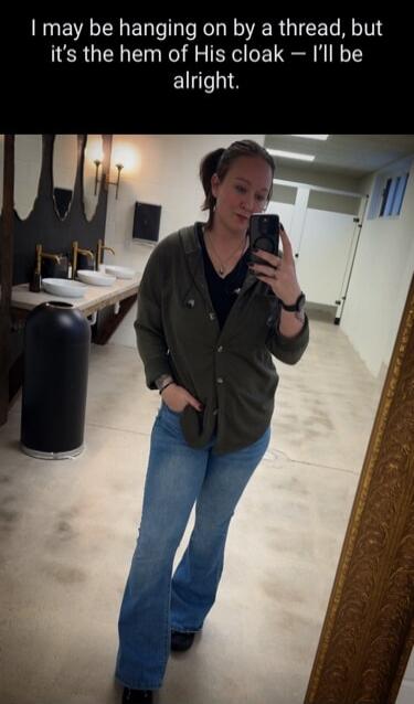 I may be hanging on by a thread, but it's the hem of His cloak — I'll be alright.