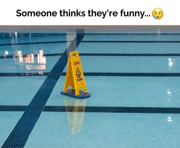 Someone thinks they're funny... CAUTION WET FLOOR