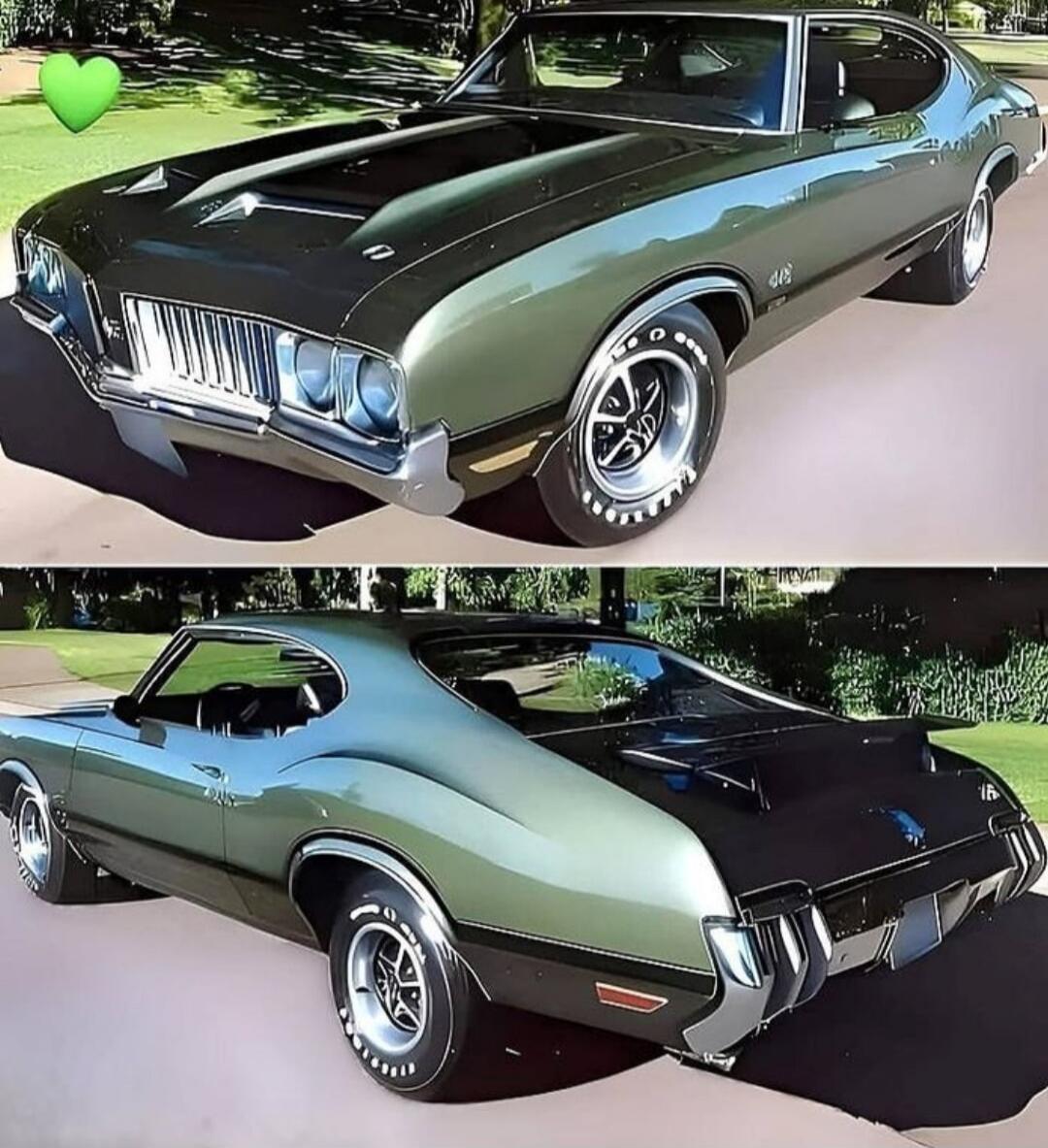 A classic Oldsmobile 442 muscle car, with 'GOODYEAR' visible on the tires.