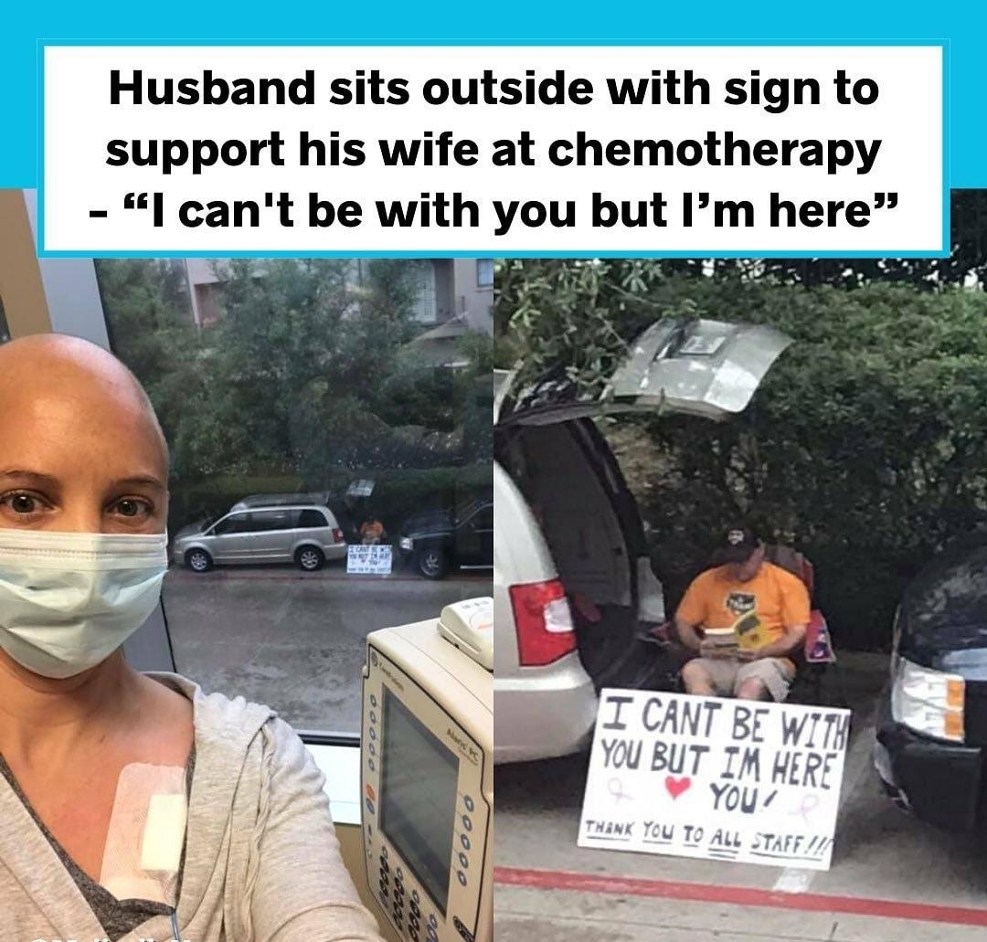 Husband sits outside with sign to support his wife at chemotherapy l cant be with you but Im here TR 2 1 2 S PR P