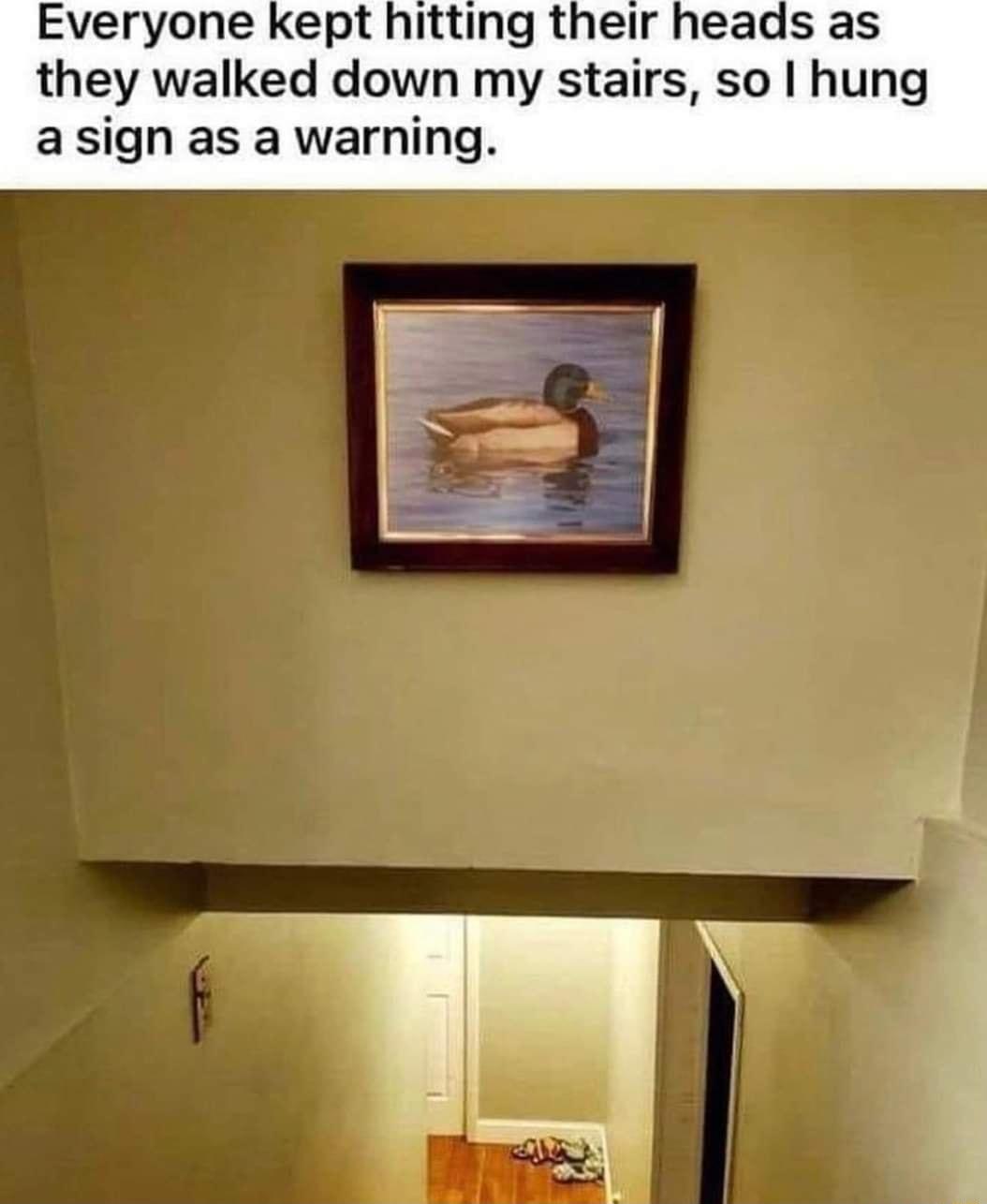 Everyone kept hitting their heads as they walked down my stairs so hung asign as a warning