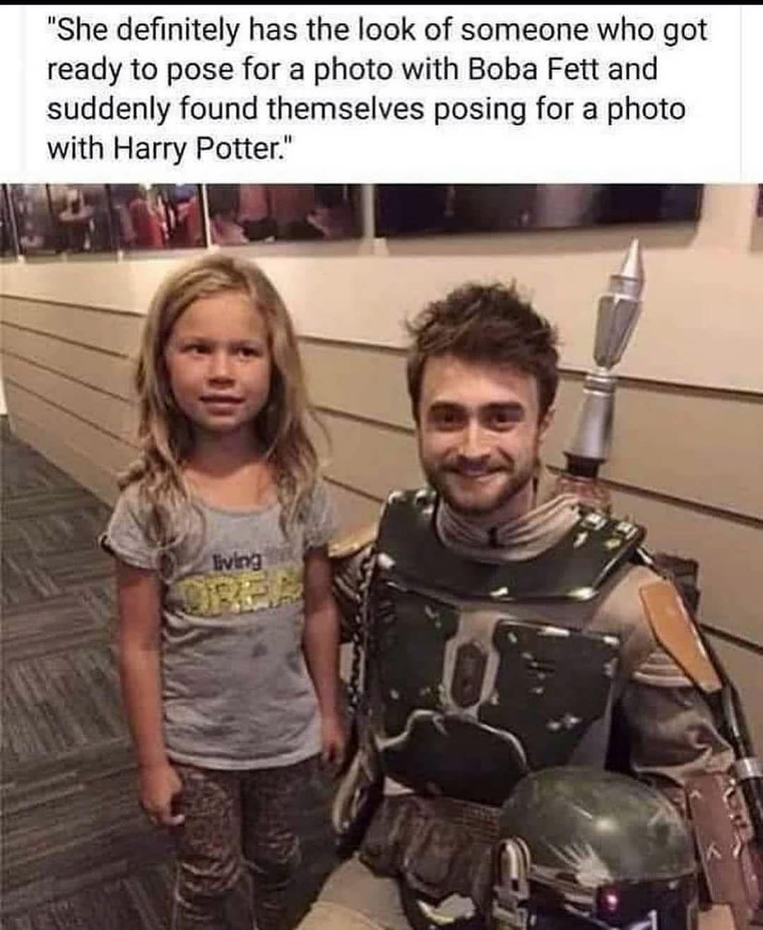 She definitely has the look of someone who got ready to pose for a photo with Boba Fett and suddenly found themselves posing for a photo with Harry Potter