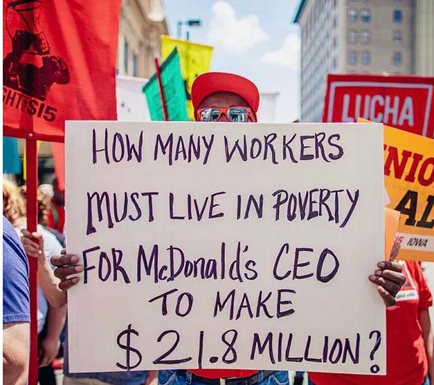 00 NI WORKERS g k NUST LIVE IN POVERTY 41 OYMtDllis CED T0 MAKE 218 MILLIN i e e O