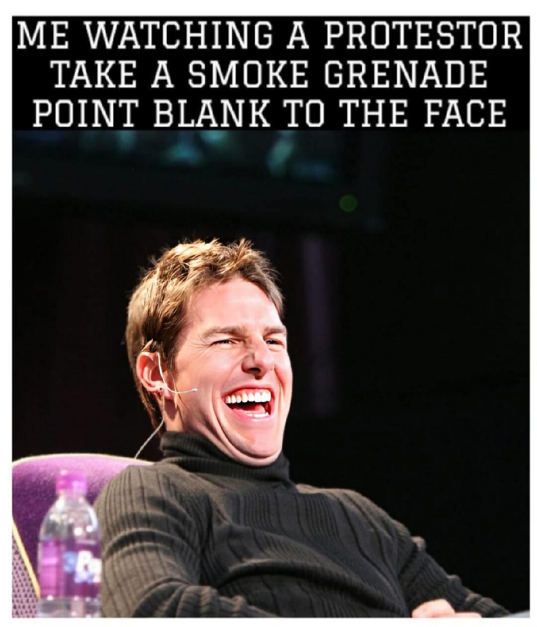 ME WATCHING A PROTESTOR TAKE A SMOKE GRENADE POINT BLANK TO THE FACE