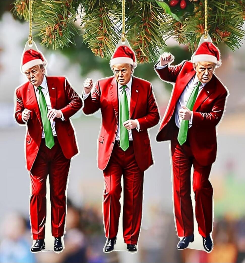 Three identical men in red suits and green ties wearing Santa hats are hanging from Christmas tree branches, appearing as festive caricatures.