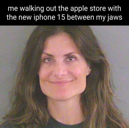 me walking out the apple store with the new iphone 15 between my jaws