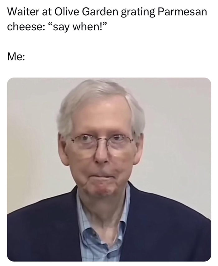 Waiter at Olive Garden grating Parmesan cheese say when Me