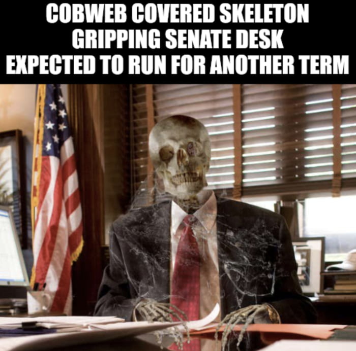 COBWEB COVERED SKELETON GRIPPING SENATE DESK EIIEIHEII TORUN FIIII ANOTHER TERM