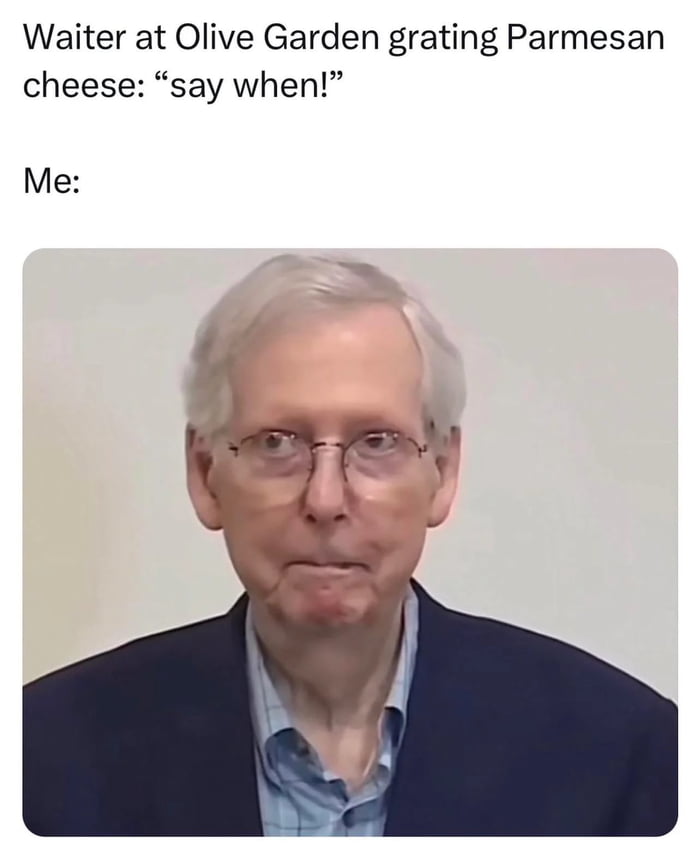 Waiter at Olive Garden grating Parmesan cheese say when Me Q Ll
