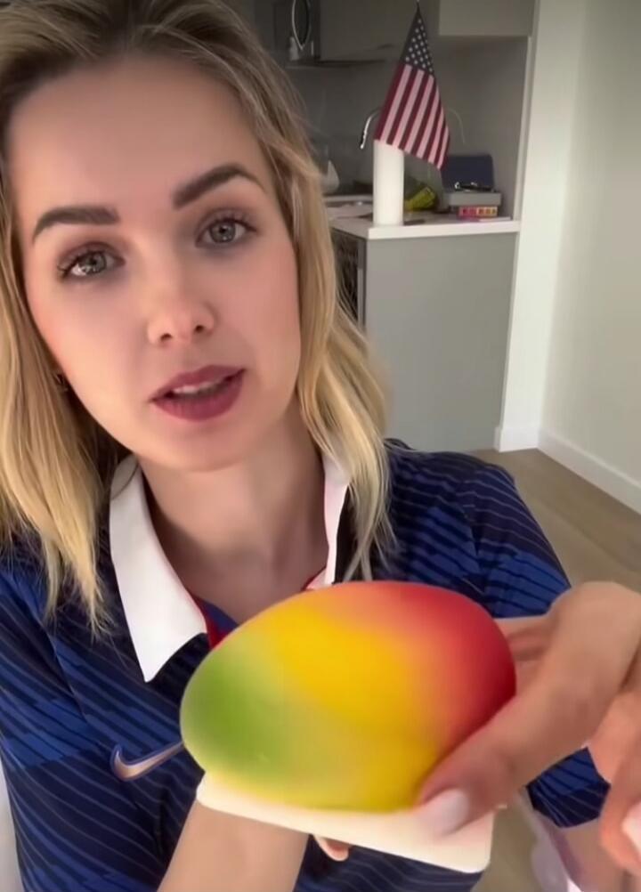 This is a very soft and colorful stress ball, shaped like a mango. It's great for relieving stress.