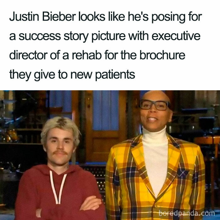 Justin Bieber looks like hes posing for a success story picture with executive director of a rehab for the brochure they give to new patients