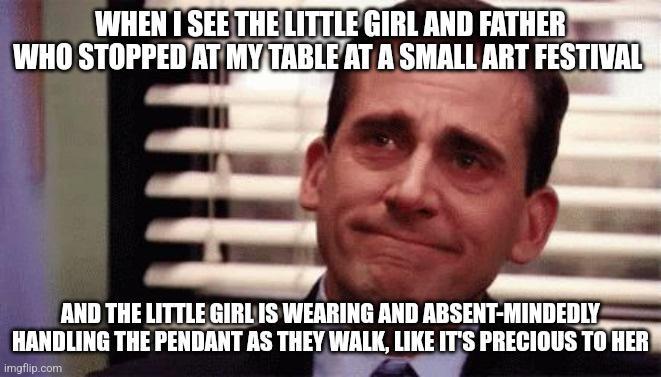 AND THE LITTLE GIRLIS WERRING AND ABSENT MINDEDLY HANDLING THE PENDANT AS THEY l ls PRECIOUS TOHERY