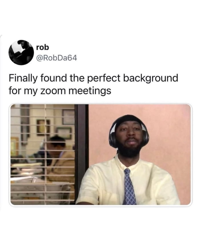rob @RobDa64: Finally found the perfect background for my zoom meetings
[Image shows a man in an office setting with blinds on the left side and a plain wall on the right, wearing a shirt and tie with headphones.]