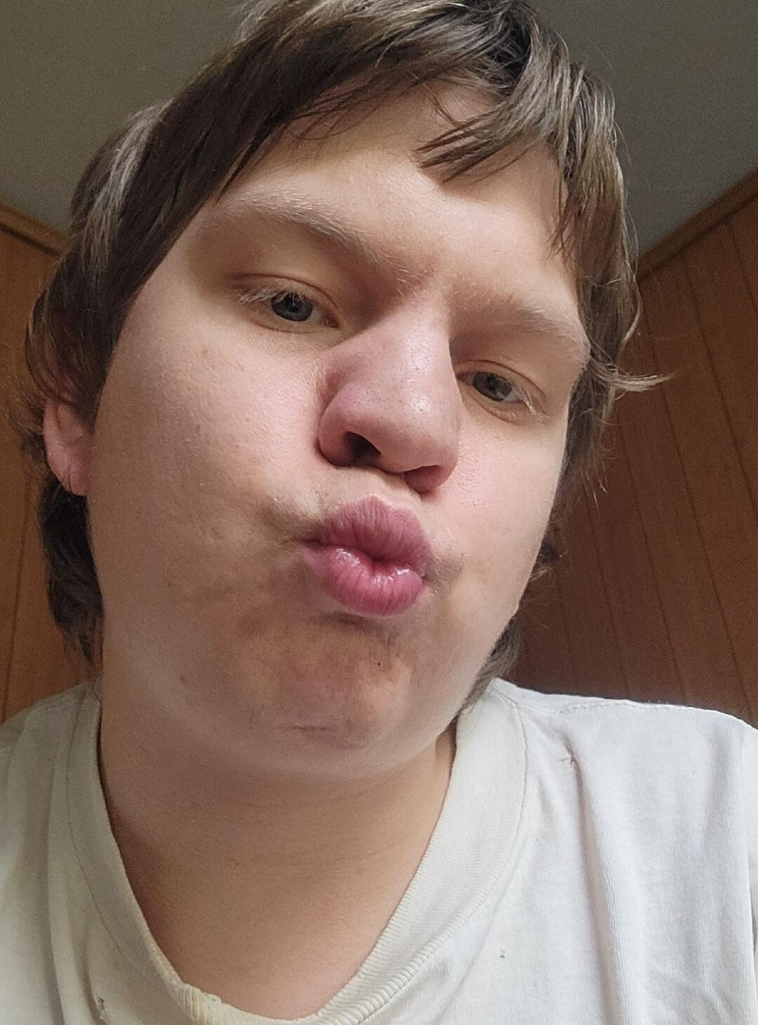 A person making a kissing face.