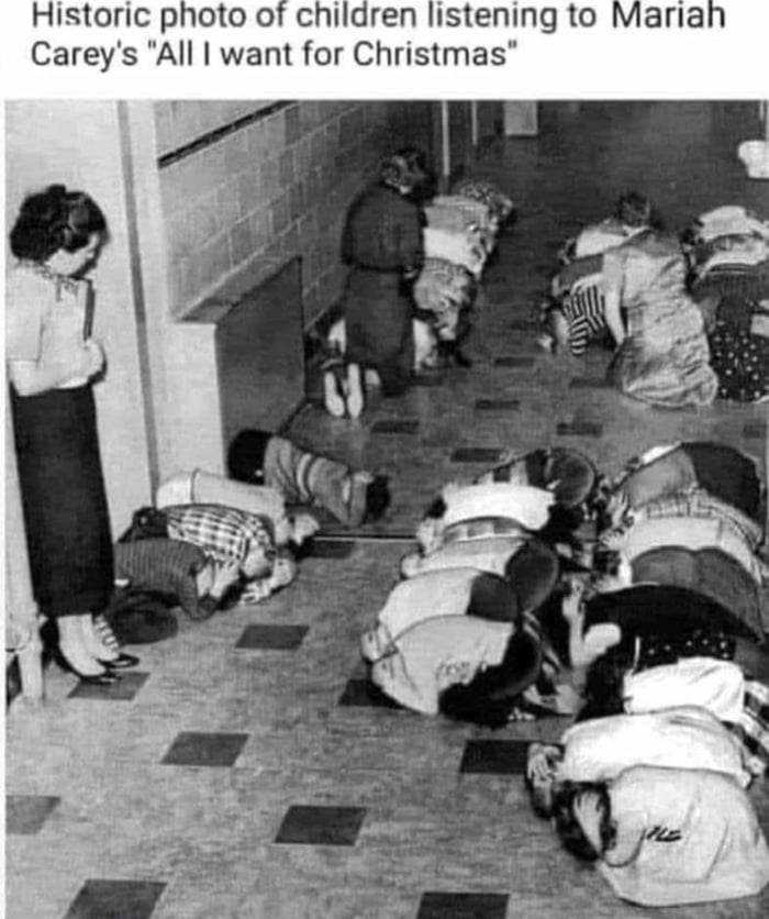 Historic photo of children listening to Careys All want for Christmas