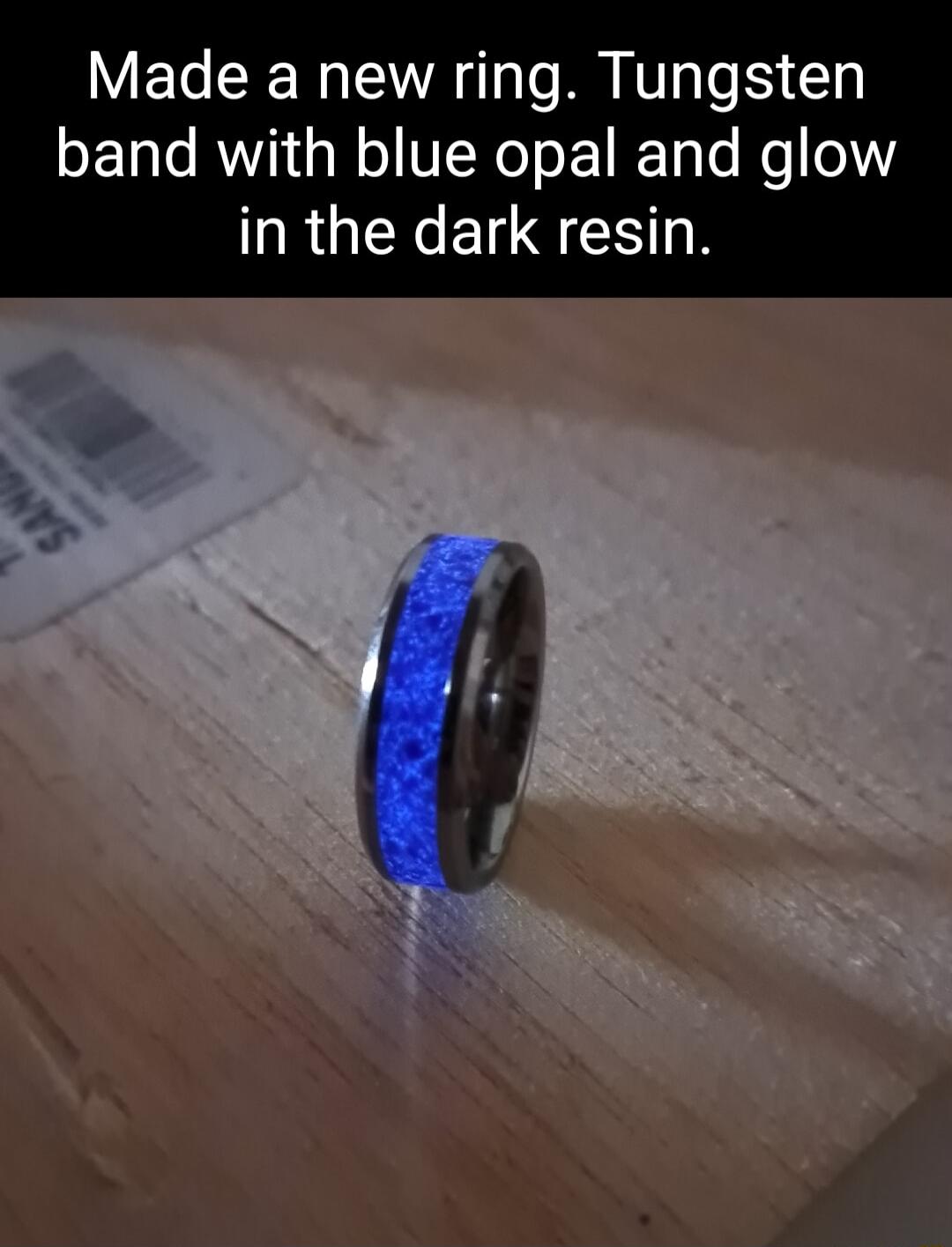 Made a new ring Tungsten band with blue opal and glow IRGINE IS